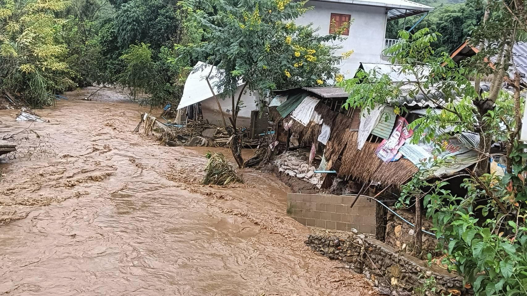 Flooded village and damaged homes in the aftermath of regional flooding
