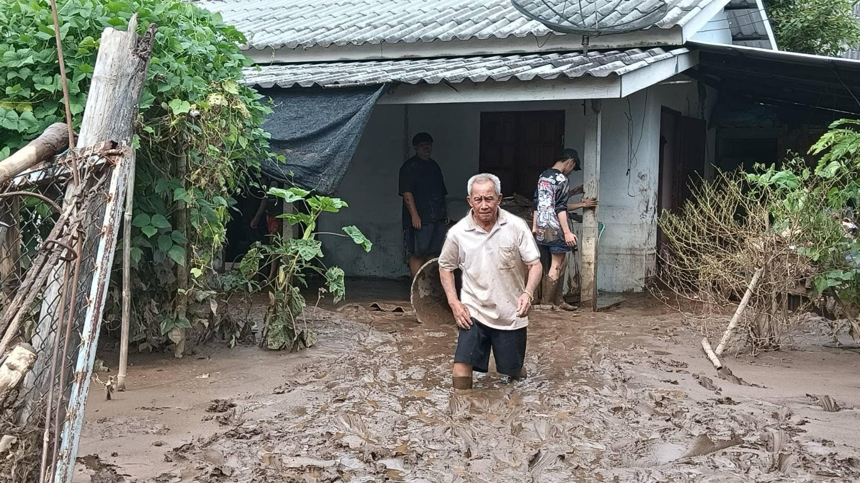 Damaged roads and homes in Thailand after flooding